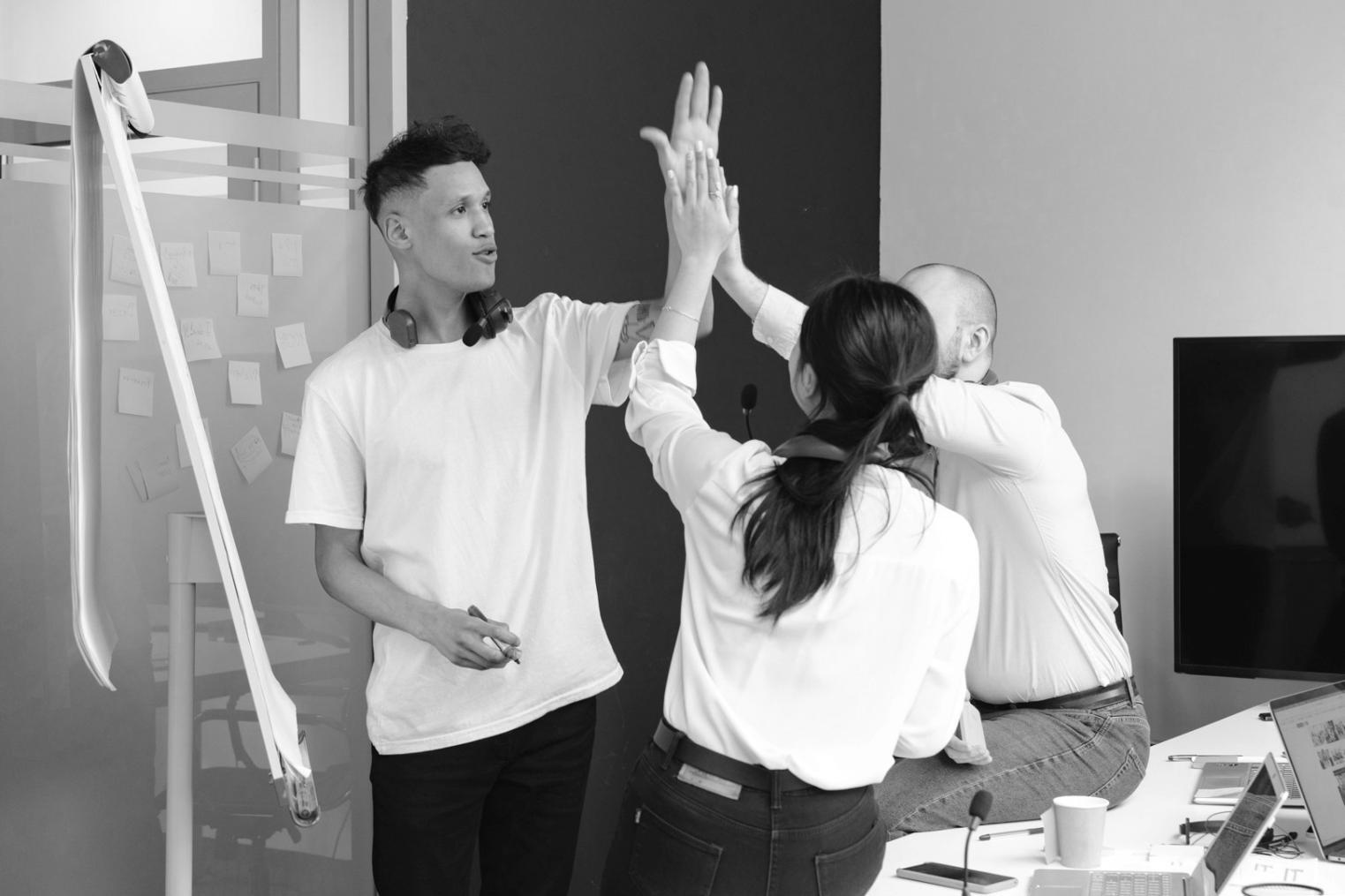 Clean organized desk with digital planning tools and notebook for effective goal planning workflow